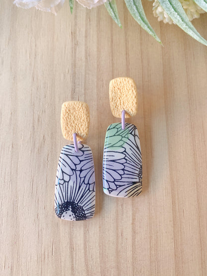 Pendientes florales de arcilla polimérica – Margaritas y tonos pastel