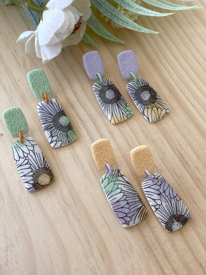 Pendientes florales de arcilla polimérica – Margaritas y tonos pastel