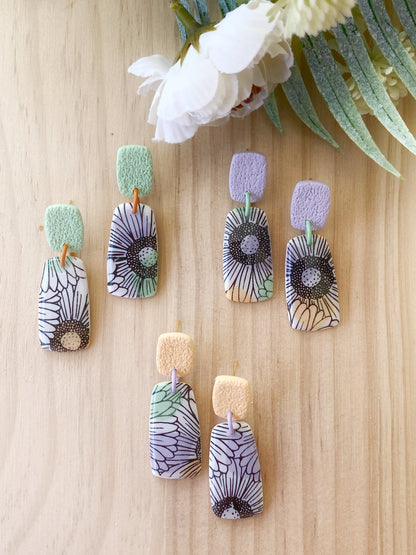 Pendientes florales de arcilla polimérica – Margaritas y tonos pastel